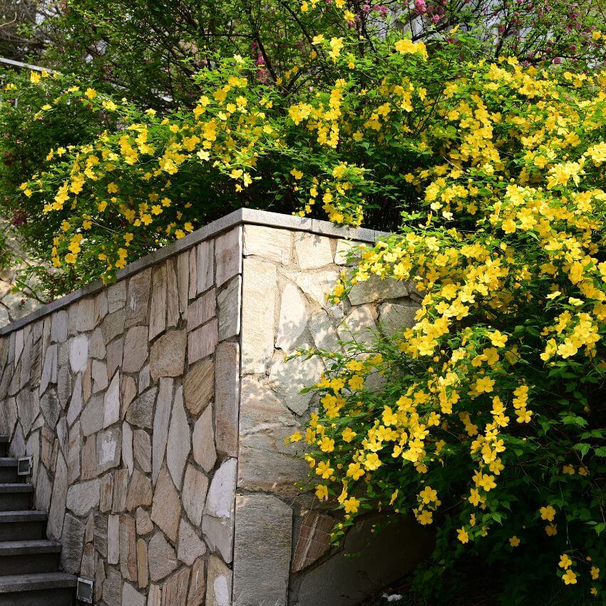 Stone retaining wall installation project final inspection